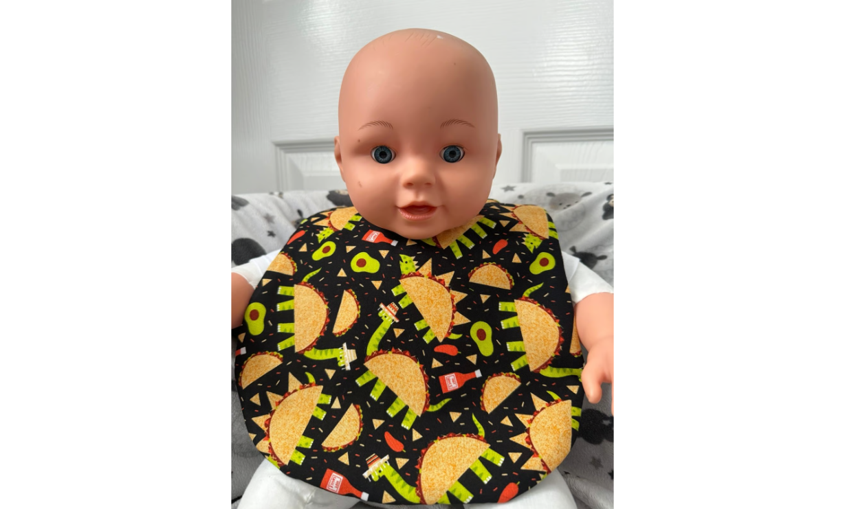 The Dino Dino Baby Bib (0-9 months)