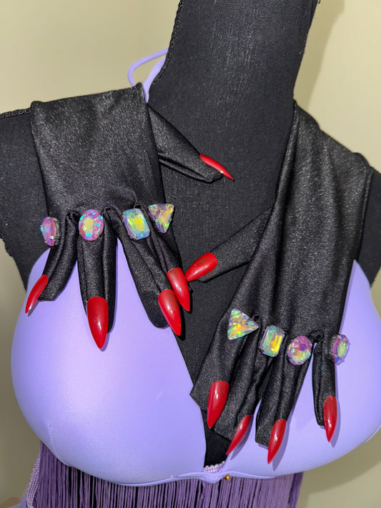 Black fashion gloves with 10 red stilletto nails attached and 8 blue-purple colored gems attached to the pointer, middle, ring, and pinky finger.