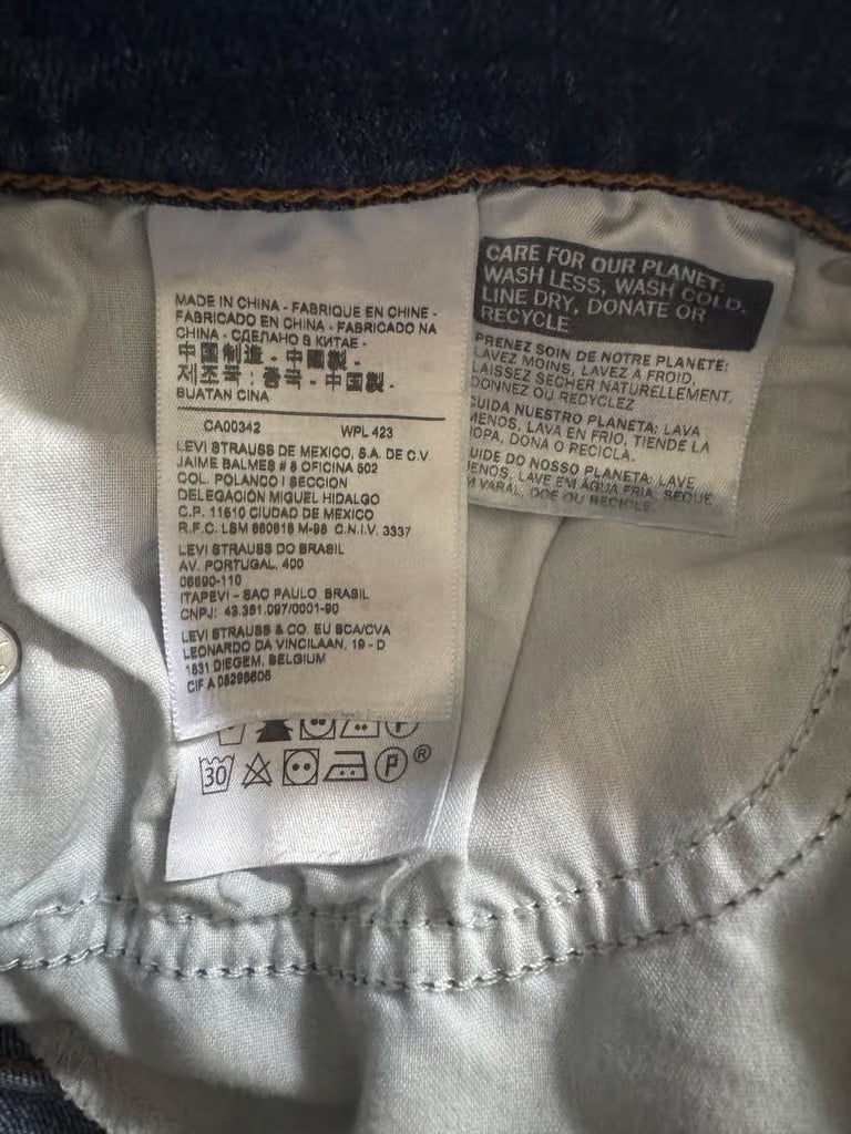 Levi Denim Shorts with Distressed look (Size W28)